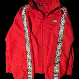 Obey red windbreaker with hood.